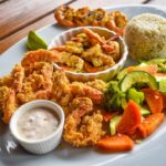 Food and the waterfront at Fort Consolation, Roatan