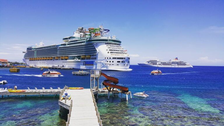 Cruise ships docked at the Port of Roatan seen from the pier