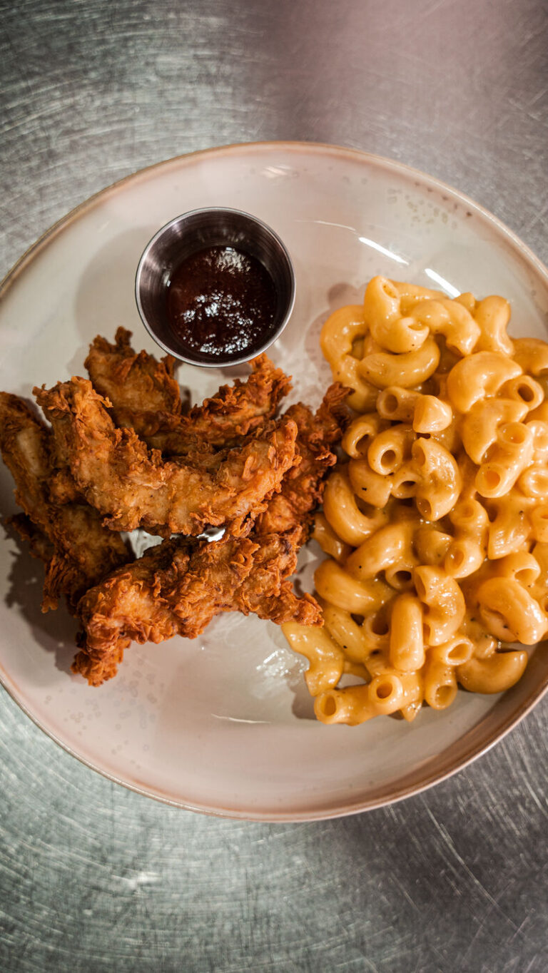 Crispy chicken fingers with barbecue dipping sauce